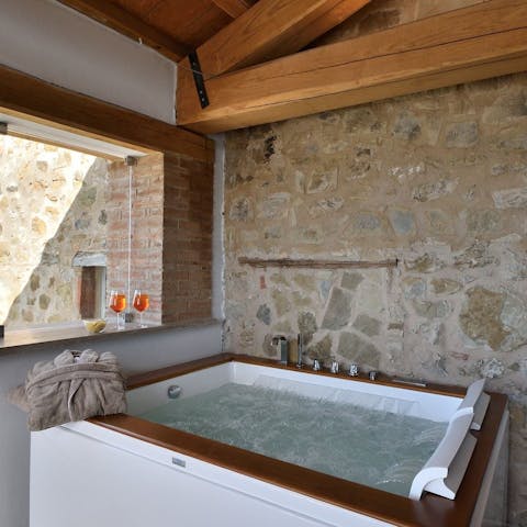 Sip a glass of wine as you relax in the private hot tub