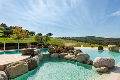Swim in the communal pool as the quiet of nature surrounds you