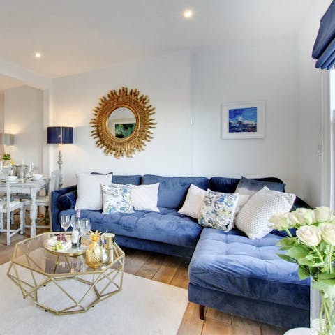 Settle down on the sumptuous sofa with loved ones to enjoy a movie night