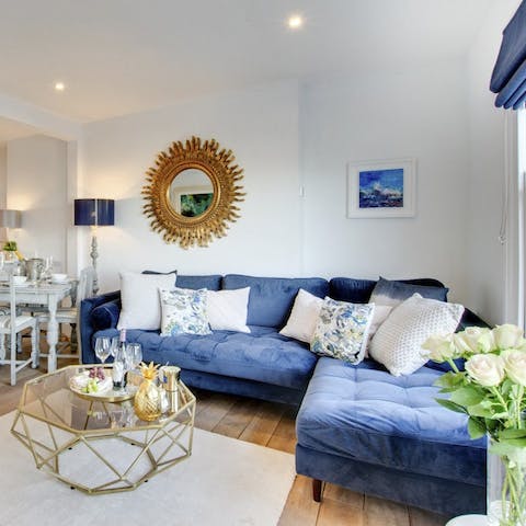 Settle down on the sumptuous sofa with loved ones to enjoy a movie night