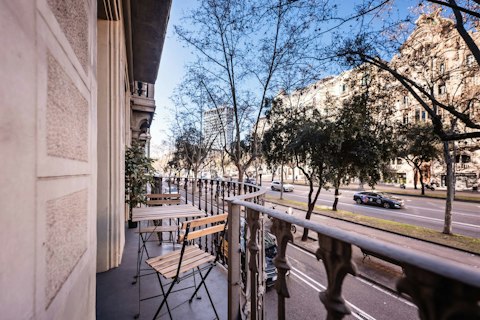 Take breakfast above Barcelona's tree-lined boulevard