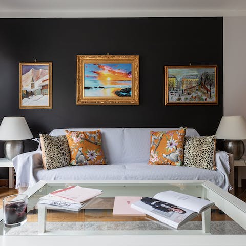 Kick back in the stylish living room with a glass of wine and a good book