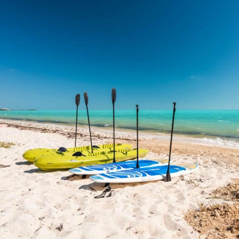 Go kayaking or paddleboarding in the turquoise shores of the Pacific Ocean