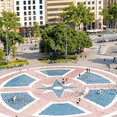 Soak up the bustle of Plaça de Catalunya, it's just around the corner