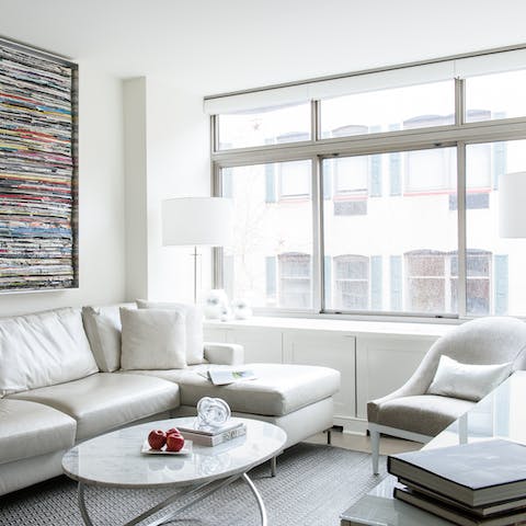 Settle down for a chilled night at home in the bright living area