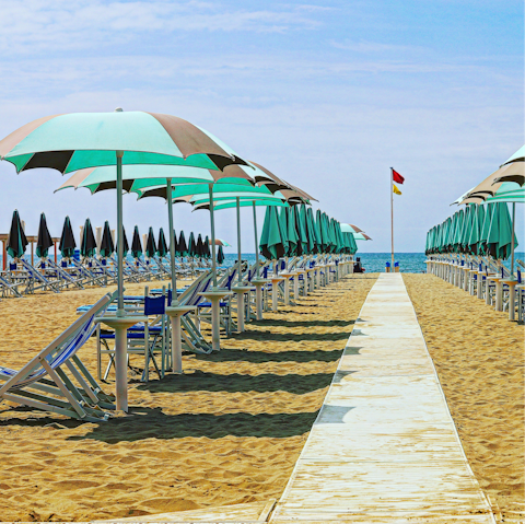 Relax on golden beaches in nearby Viareggio