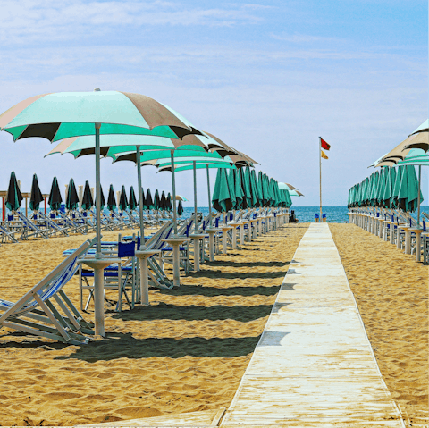 Relax on golden beaches in nearby Viareggio