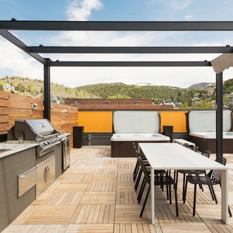Enjoy the communal deck, with its barbecue and hot tub