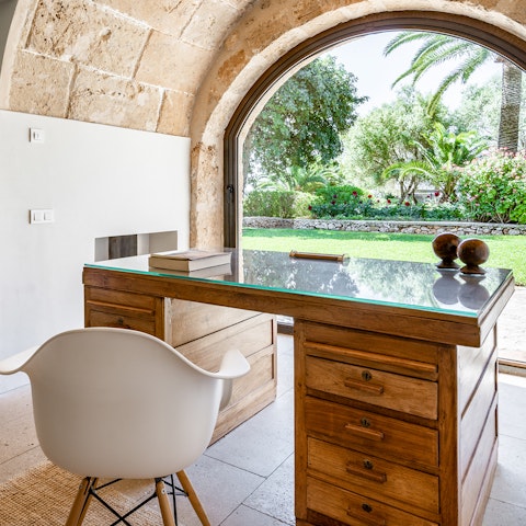 Get some work done at the antique desk in the separate study