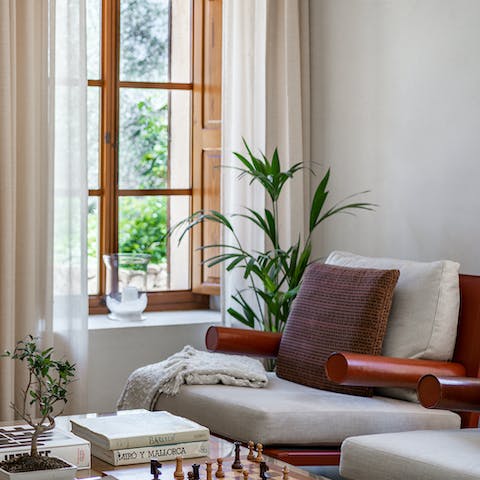 Unwind after a jam-packed day with a glass of wine in the stylish living area