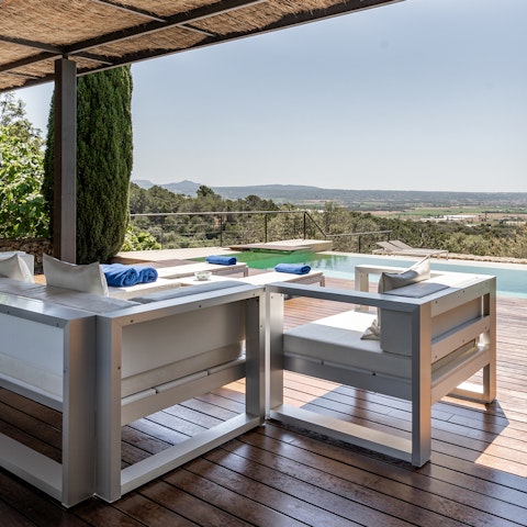 While away afternoons under the covered terrace, a cocktail and good book in hand