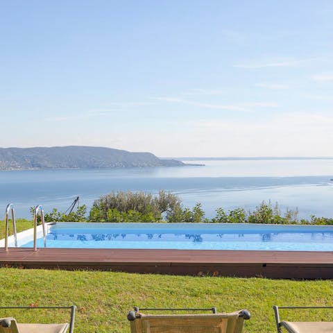 Sip Italian wine by the pool while enjoying a postcard view, then book a spa-like massage
