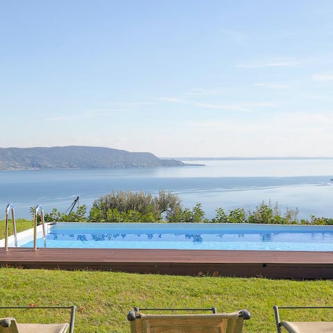 Sip Italian wine by the pool while enjoying a postcard view, then book a spa-like massage