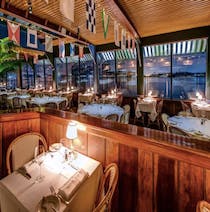 Have drinks and an elegant dinner on the East River