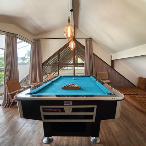 Challenge your guests to a fun game of pool