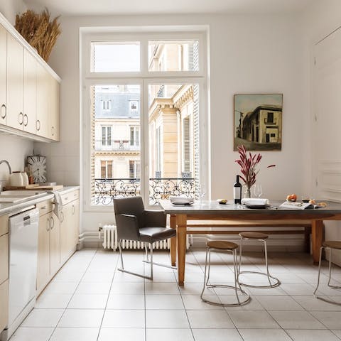 Rustle up a meal or two in the glossy kitchen-diner