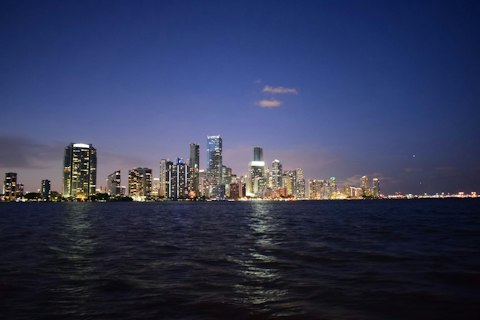 Admire Biscayne Bay's shimmering turquoise waters and iconic Miami skyline, a twenty-minute drive
