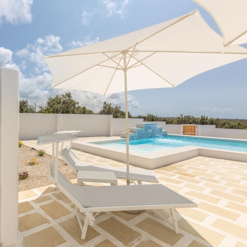 Lounge by the pool after a morning dip