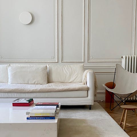 Relax in the elegant sitting room with a book from the library