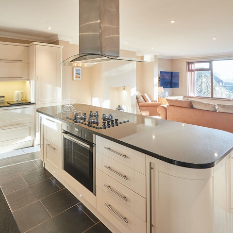 Cook in the sleek kitchen or tuck into takeaway fish and chips