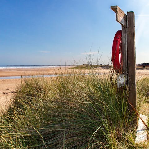 Discover the golden sands of Alnmouth Beach – it's a thirteen-minute walk