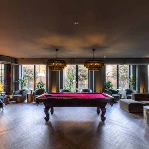 Relax and unwind in the communal games room