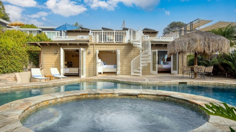 Soak in the bubbling hot tub steps from your bedroom