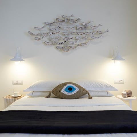 Rest up after a long day at the beach in the crisp, white bedrooms
