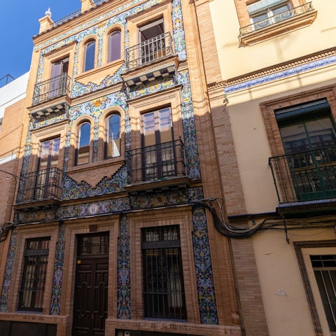 Take some snaps of this 19th-century building’s Spanish ceramic tile façade