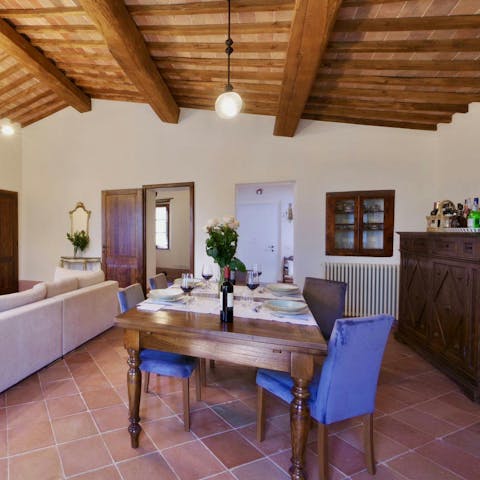 Dine in on wild boar ragu beneath rustic wooden beams