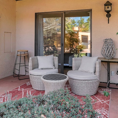 Unwind on the private terrace with a glass of something chilled in hand