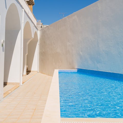 Take advantage of the building's communal pool
