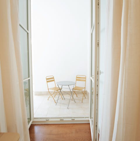 Relax on your private terrace with a glass of wine in the early-evening