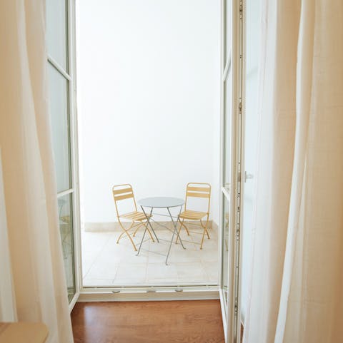 Relax on your private terrace with a glass of wine in the early-evening