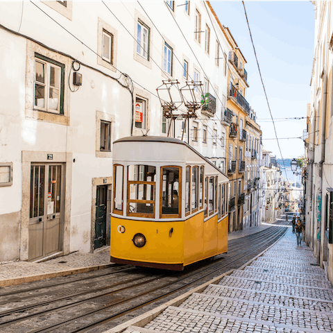 Enjoy pretty river views from the Bica Funicular, a five-minute walk away