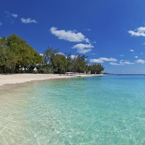Bliss out on the idyllic Sandy Lane Beach, just a five-minute drive away