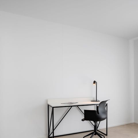 Hit send on those last few emails from your sleek and minimal desk space