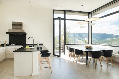 Cook and dine with sweeping mountain slopes as your backdrop