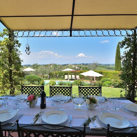 Admire the Tuscan countryside views from the terrace