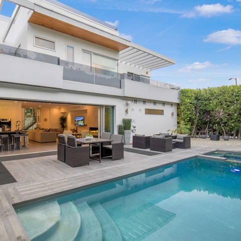 Enjoy morning dips in the pool and evening meals alfresco