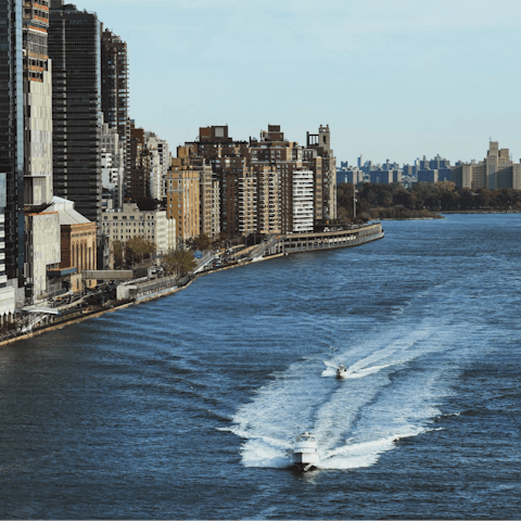 Go for a walk along the East River, just one block away