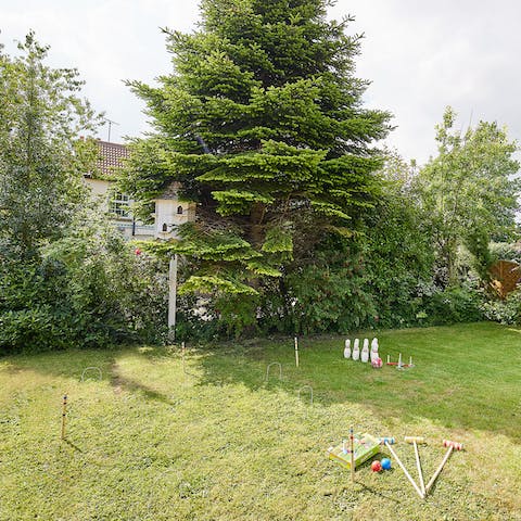 Pass carefree afternoons playing games on the home's large lawn