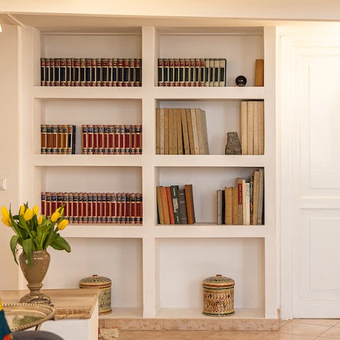 Enjoy your downtime reading with a cappuccino in the stylish living room