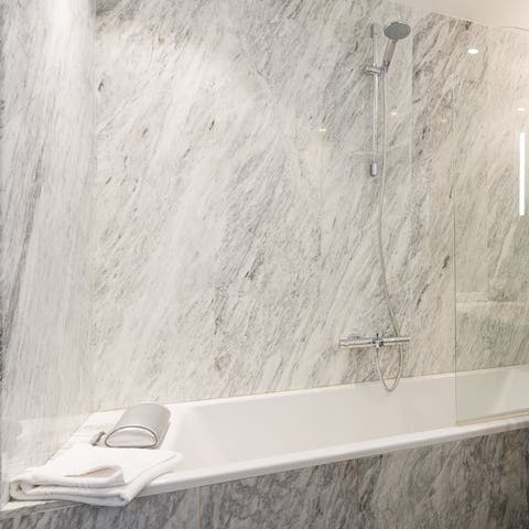 Relax in the marble-clad tub after a day of wandering Montmartre's hilly streets