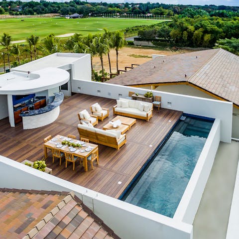 Go for a dip in the rooftop pool with its ocean views