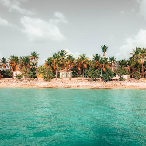 Relax on one of three pristine white sandy beaches at this renowned resort