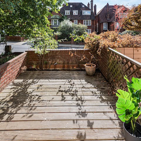 Step out of the second bedroom each morning for some fresh air on the deck
