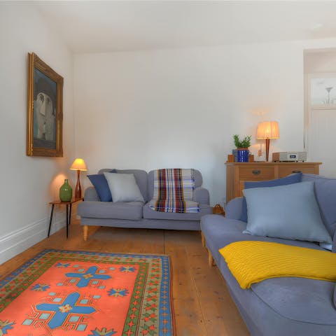 Get cosy in the living area after a coastal walk