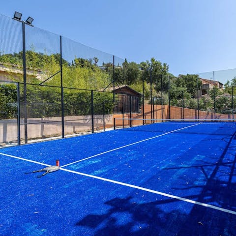 Work up a sweat on the private tennis court
