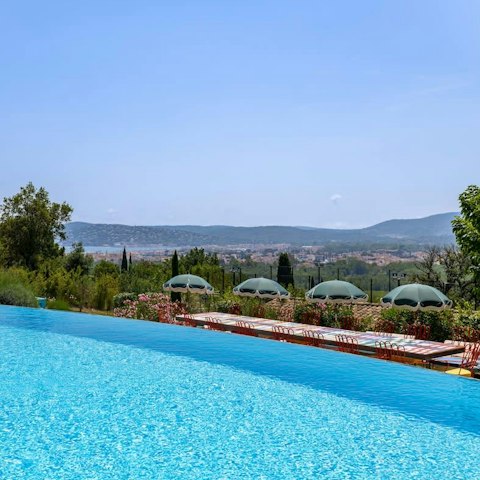 Soak up panoramic views from the infinity pool
